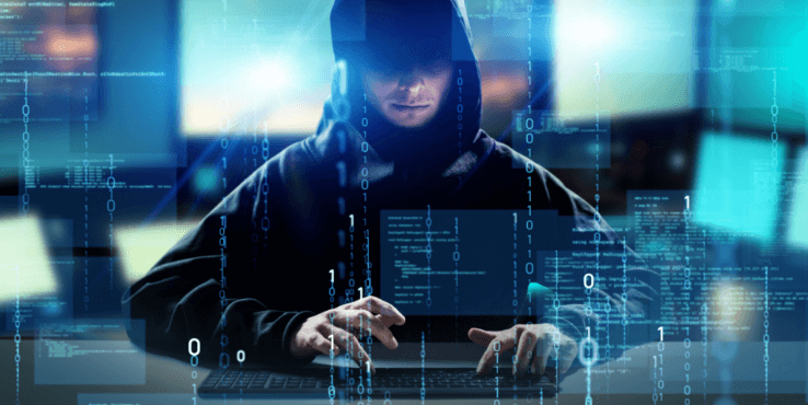 高度なサイバーテクノロジーを操るフードを被った人物